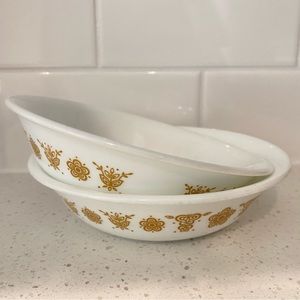 Two Corelle snack bowls with gold details